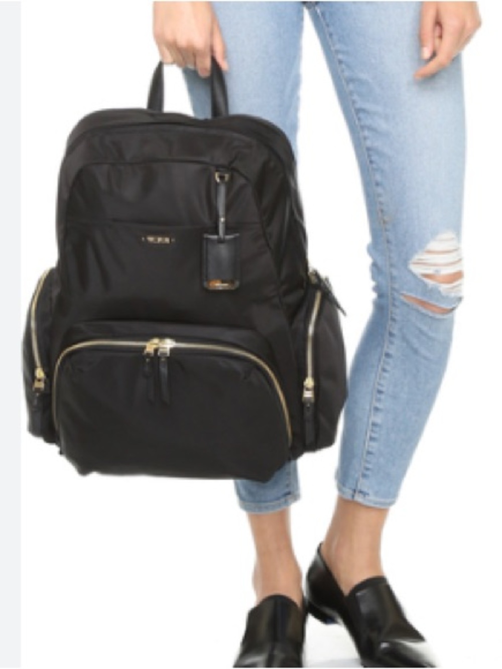 Tumi Black Backpack with Gold Accents